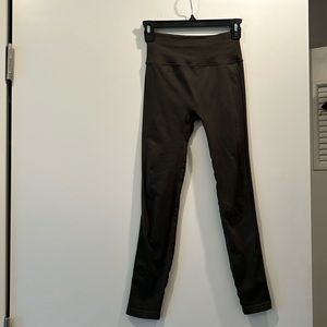 Lululemon dark olive green size 4 leggings. Tag fell off.